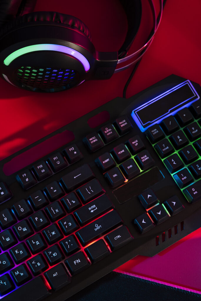 gradient-illuminated-neon-gaming-desk-setup-with-keyboard