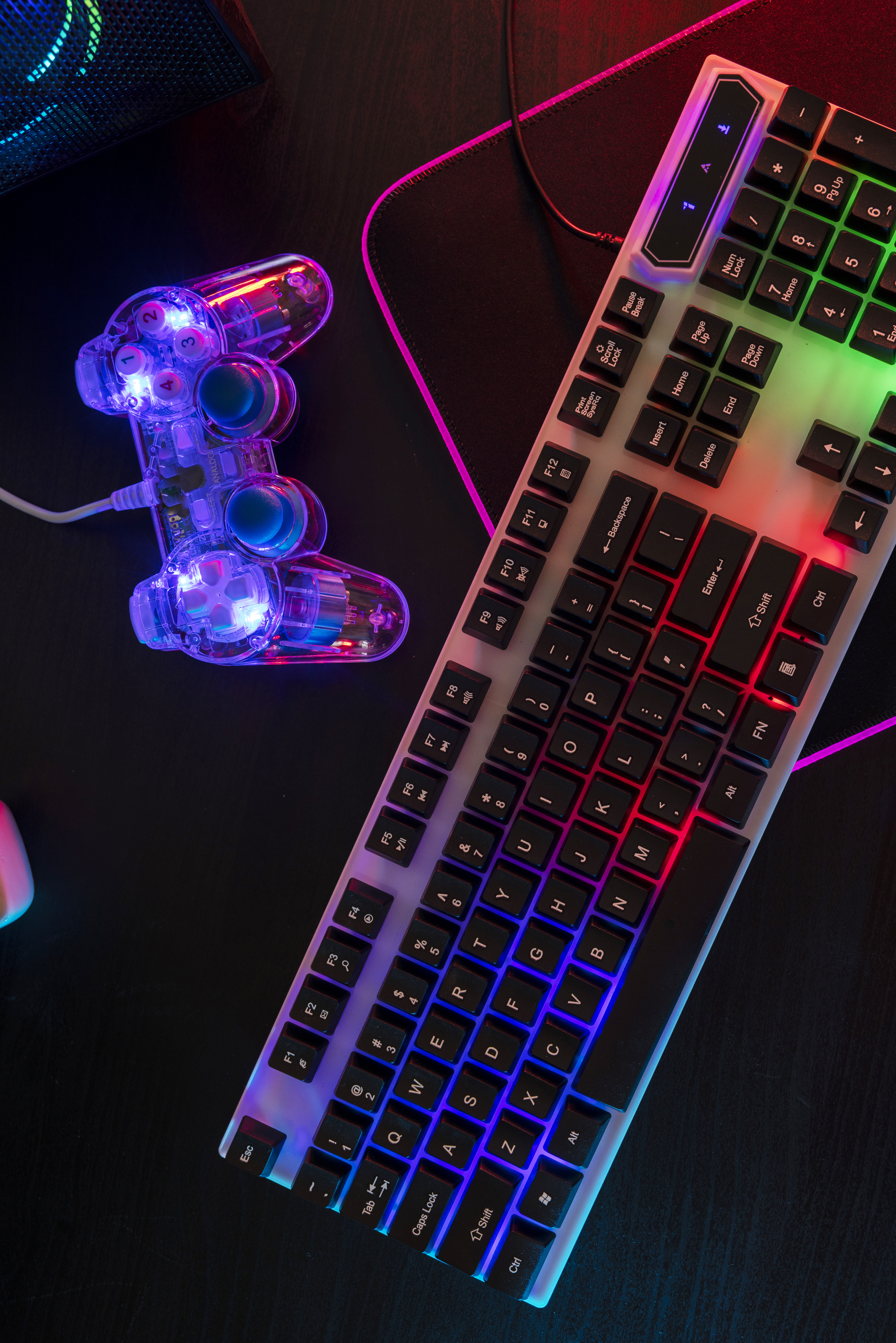 view-illuminated-neon-gaming-keyboard-setup-controller